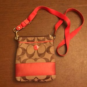 Brown and orange Coach crossbody purse